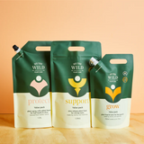 We The Wild Essential Trio Value Pack of indoor plants featuring lush, green foliage in natural pots.