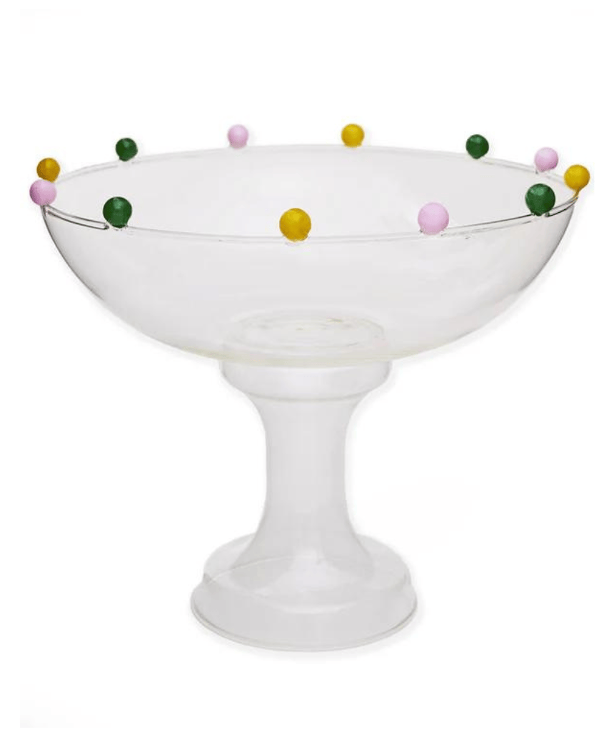 Colorful Kip & Co Smartie Partie fruit bowl with vibrant fruit patterns on a white background, designed for serving fresh fruit.