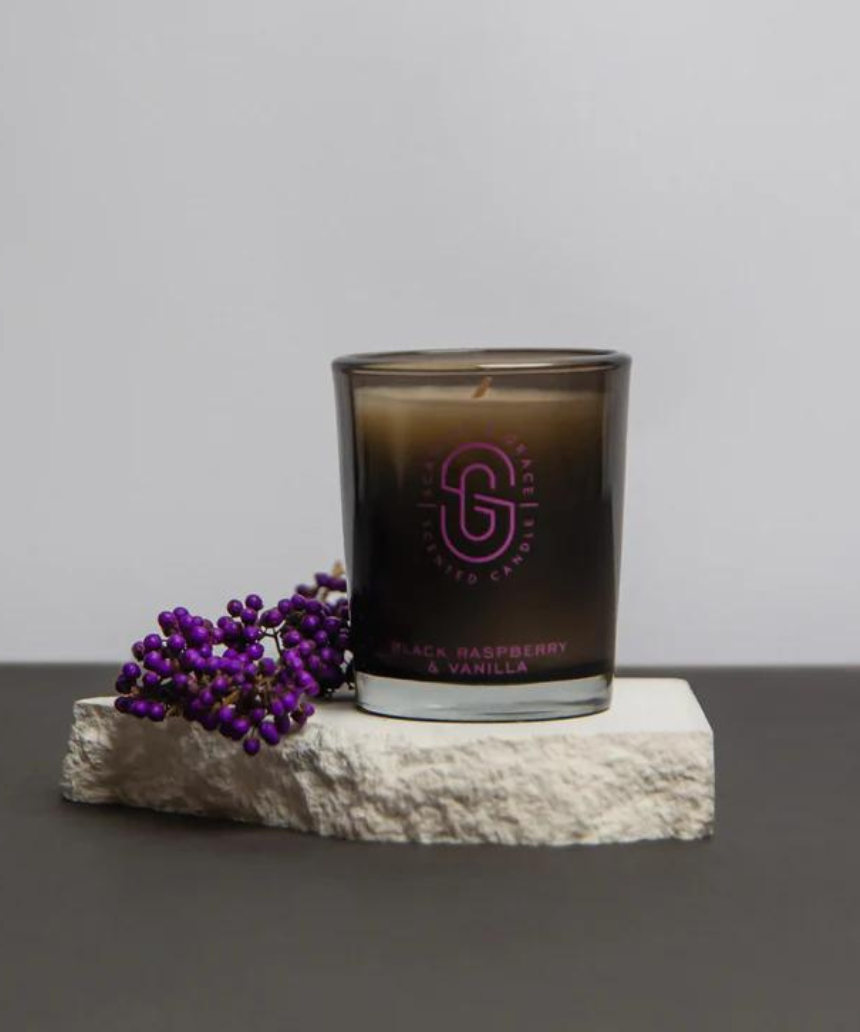 Scarlet & Grace Black Raspberry & Vanilla candle in a 60g container, featuring a sleek black design and fragrant, inviting aroma.