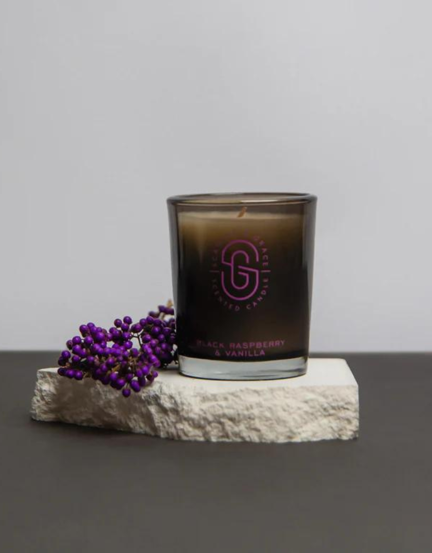 Scarlet & Grace Black Raspberry & Vanilla candle in a 60g container, featuring a sleek black design and fragrant, inviting aroma.