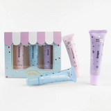 Kids natural lip gloss set by Oh Flossy featuring colorful, shiny lip gloss tubes in bright packaging.