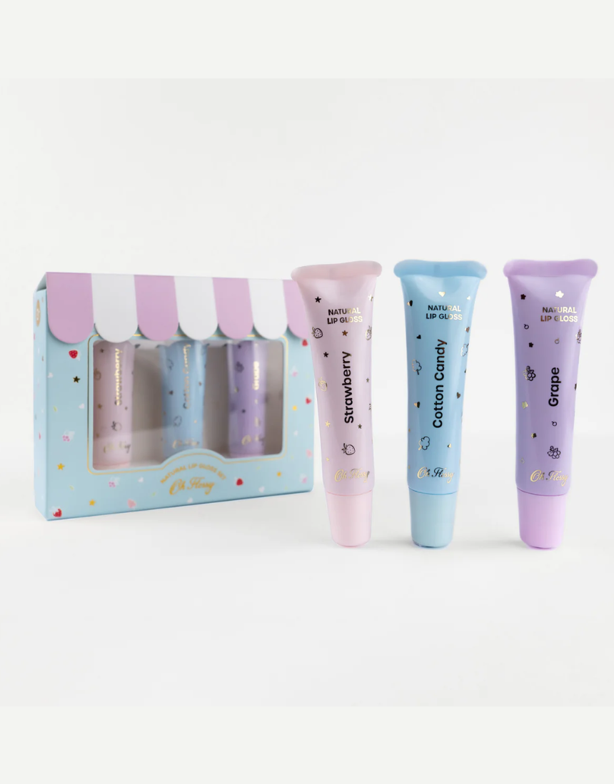 Kids natural lip gloss set by Oh Flossy featuring colorful, glossy lip products in playful packaging for children.