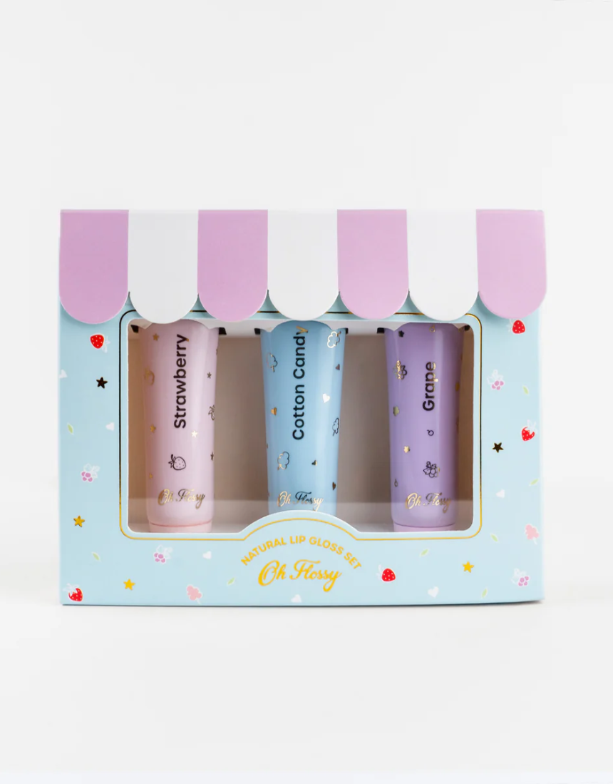 Kids natural lip gloss set by Oh Flossy featuring colorful, shiny lip gloss tubes in playful packaging.