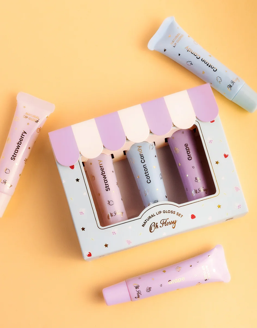 Kids natural lip gloss set by Oh Flossy featuring colorful, kid-friendly lip gloss containers with playful packaging.