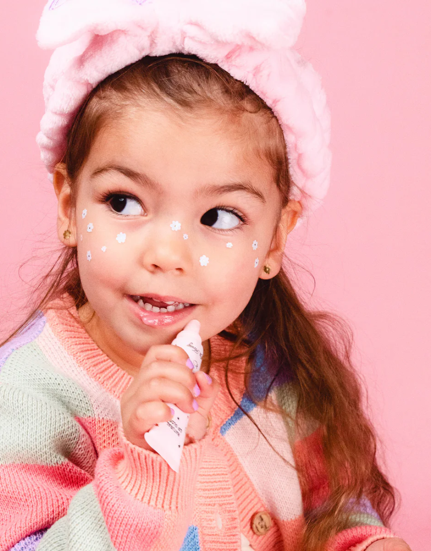 Oh Flossy natural lip gloss set for kids, featuring colorful, child-friendly lip gloss containers with playful design.
