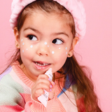 Oh Flossy natural lip gloss set for kids, featuring colorful, child-friendly lip gloss containers with playful design.