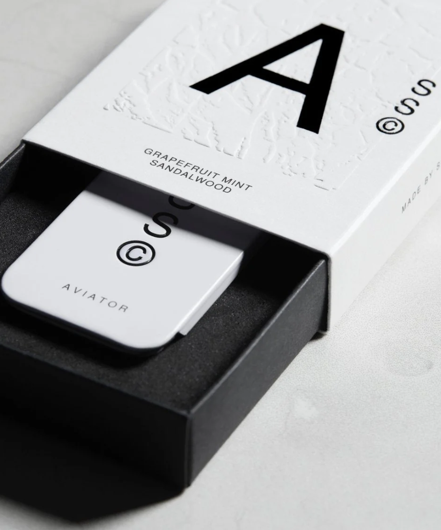 Solid State Aviator solid cologne in sleek container, showcasing its modern design and premium quality packaging.