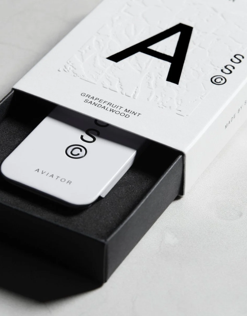 Solid State Aviator solid cologne in sleek container, showcasing its modern design and premium quality packaging.