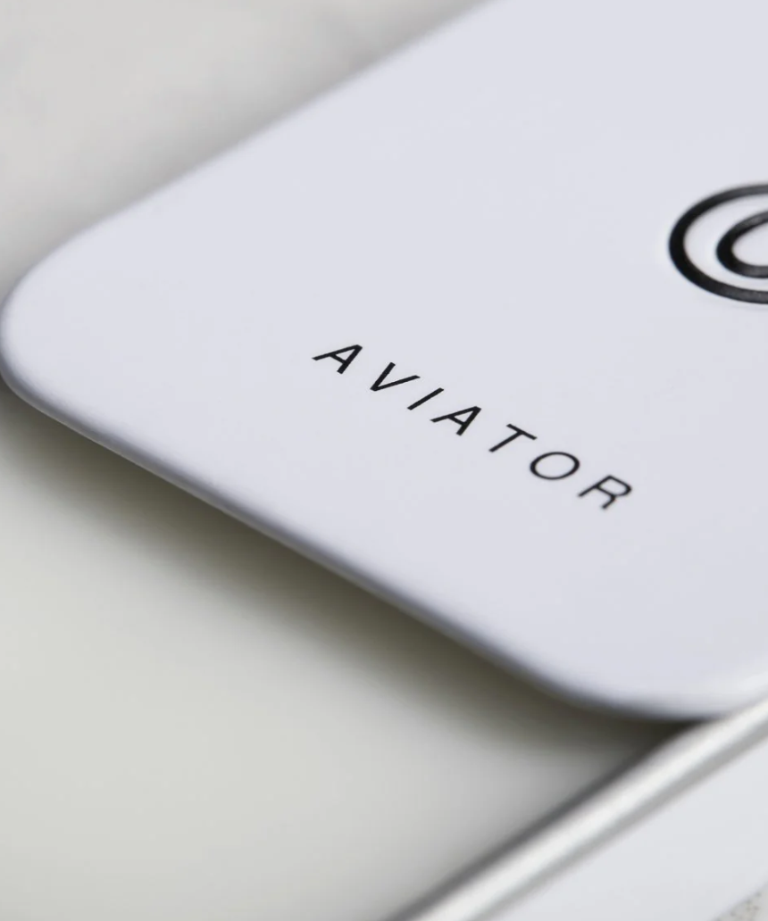 Solid State Aviator solid cologne container with sleek packaging, designed for portable use and everyday freshness.