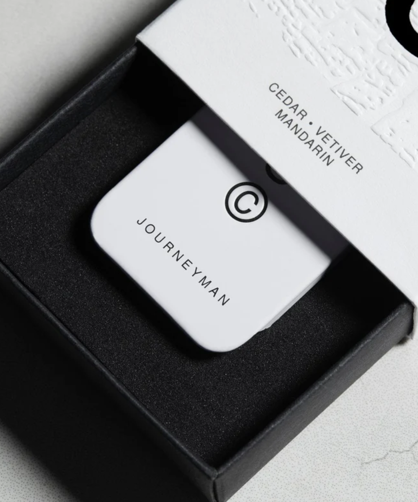 Solid State Journeyman solid cologne bottle with sleek packaging, showcasing its modern design and compact size for on-the-go use.