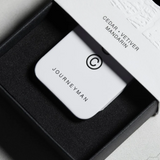 Solid State Journeyman solid cologne bottle with sleek packaging, showcasing its modern design and compact size for on-the-go use.