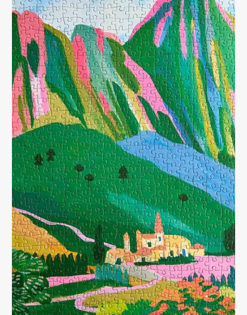 Hebe Studio The Dolomites 1000-piece jigsaw puzzle showing a scenic mountain landscape with colorful peaks and sky.
