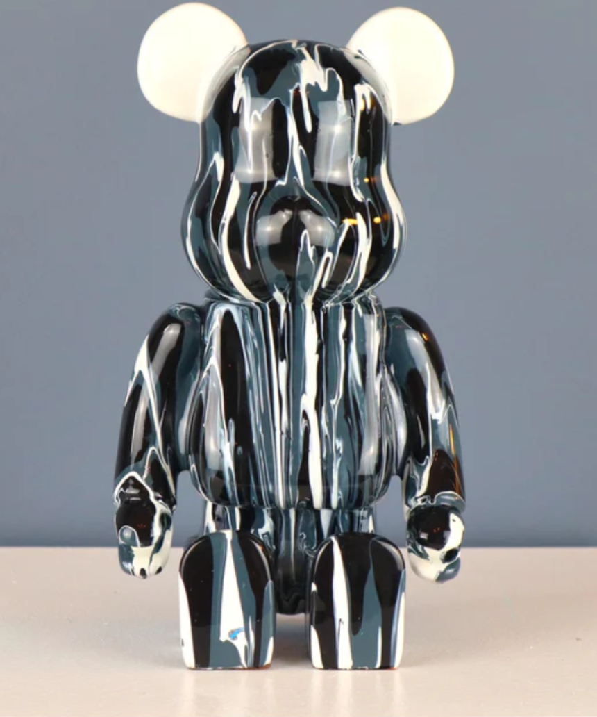 Roshi Splash Bear in white and black with splash design, showcasing a stylish, modern sneaker with bold color accents.