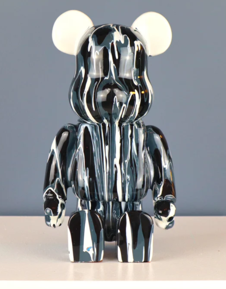 Roshi Splash Bear in white and black with splash design, showcasing a stylish, modern sneaker with bold color accents.