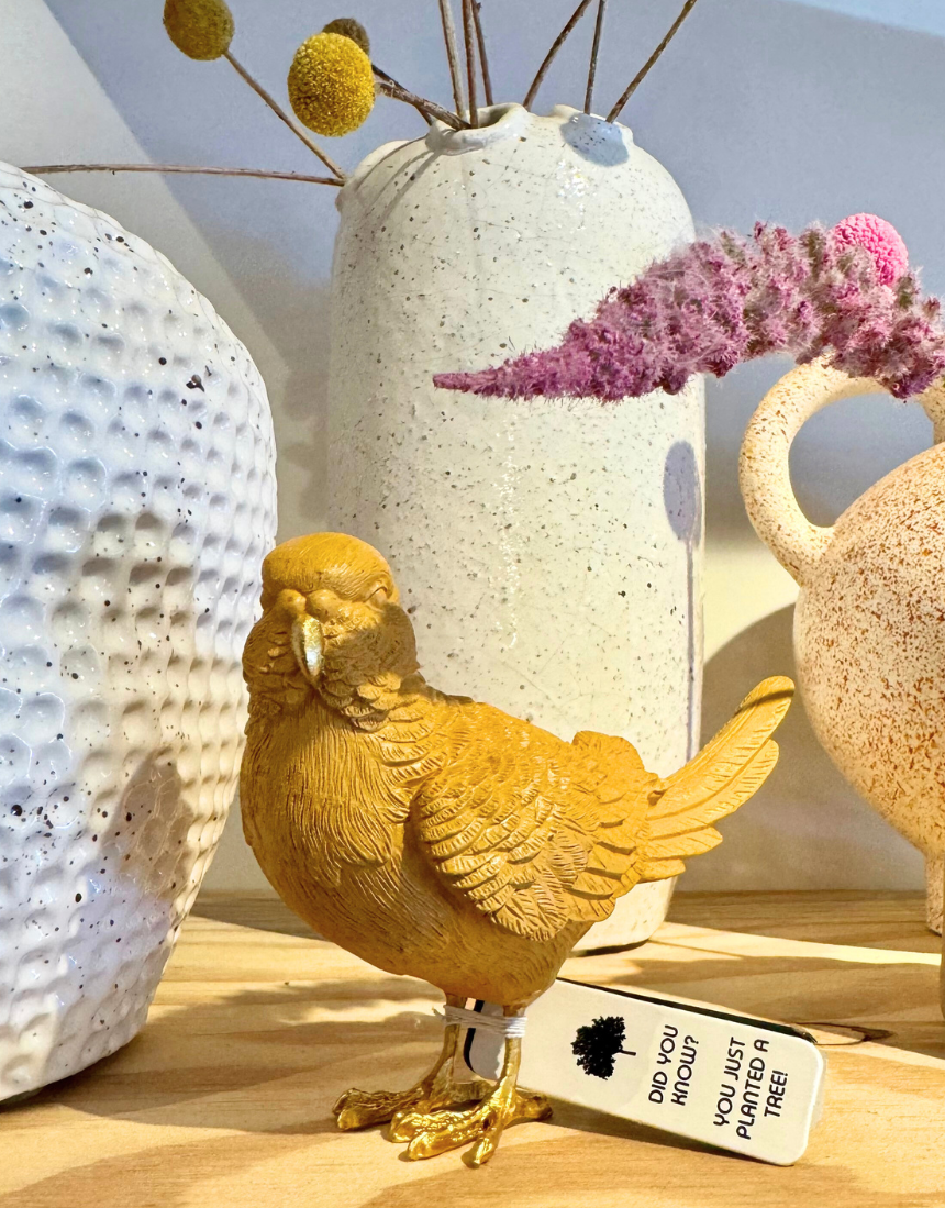 White Moose budgie-shaped homeware in mustard and gold, stylish decorative piece with a sleek white finish.