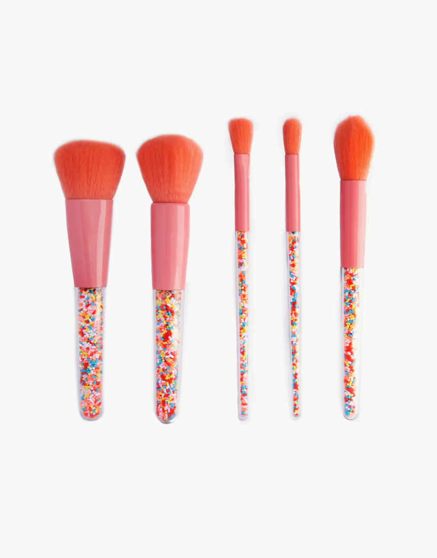 Colorful Oh Flossy Sprinkle Kids Makeup Brush Set with soft bristles and playful handles, perfect for young makeup enthusiasts.