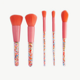 Colorful Oh Flossy Sprinkle Kids Makeup Brush Set with soft bristles and playful handles, perfect for young makeup enthusiasts.