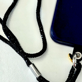 Salty Safari crossbody phone strap with sparkling diamonte accents, designed for secure and stylish wear.