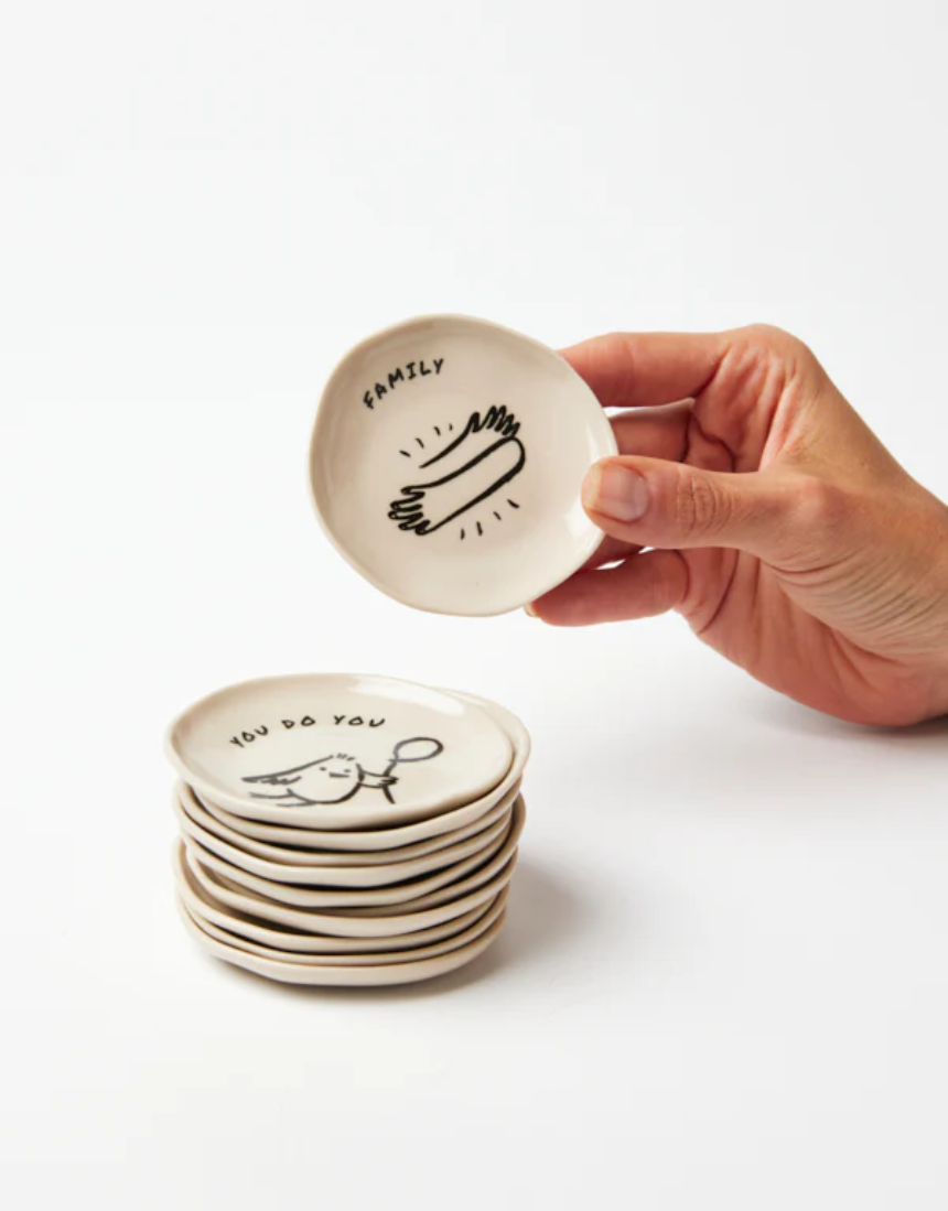 Jones & Co compare dish with a white ceramic surface and elegant design, ideal for serving or decorative use.