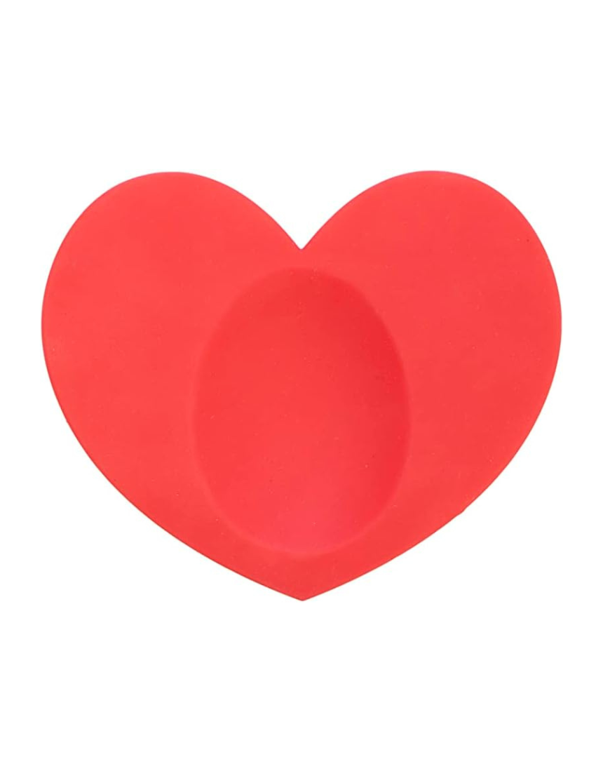 Fisura Heart-shaped spoon rest with a smooth ceramic finish, designed to hold cooking spoons and prevent messes.