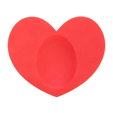Fisura Heart-shaped spoon rest with a smooth ceramic finish, designed to hold cooking spoons and prevent messes.