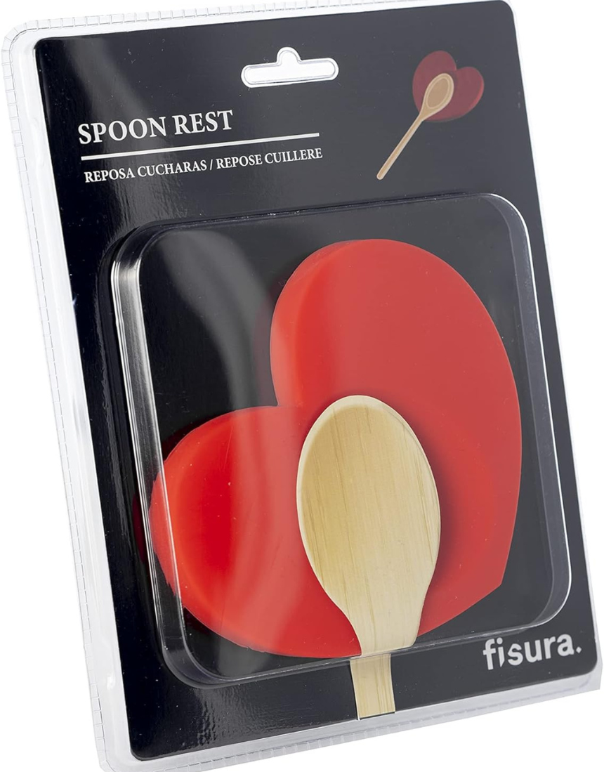 Fisura Heart-shaped spoon rest with a smooth ceramic finish, designed to hold cooking and serving spoons.