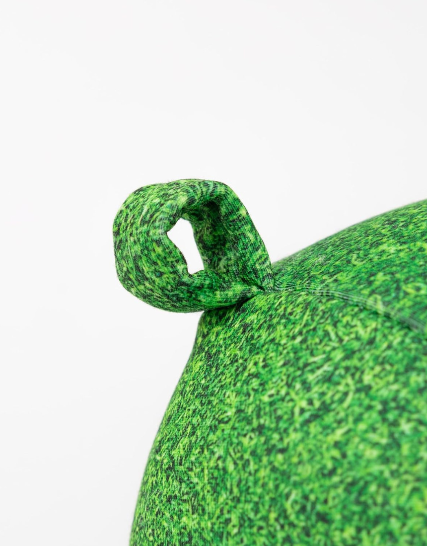 Fisura grass cushion labeled "reserved" with a textured green fabric, designed for comfortable seating or decorative use.