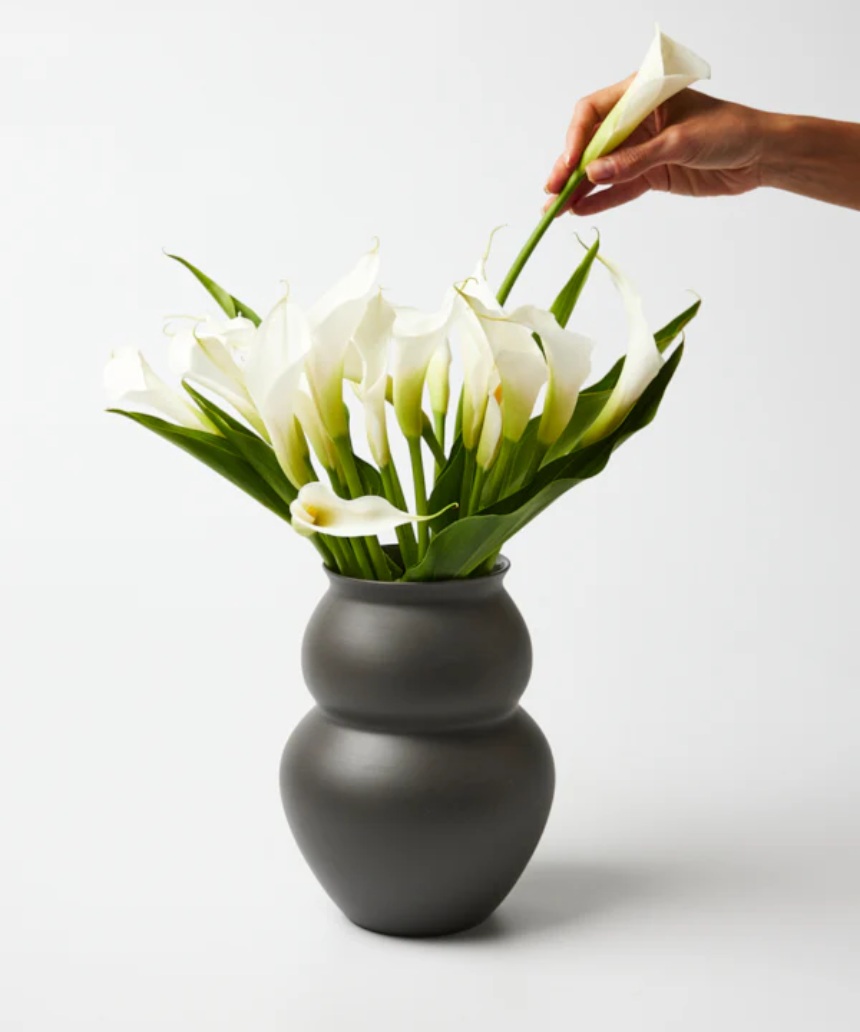 Jones & Co Happy Vase Wide Stormy, a stylish ceramic vase with a wide opening and stormy blue finish, perfect for floral arrangements.