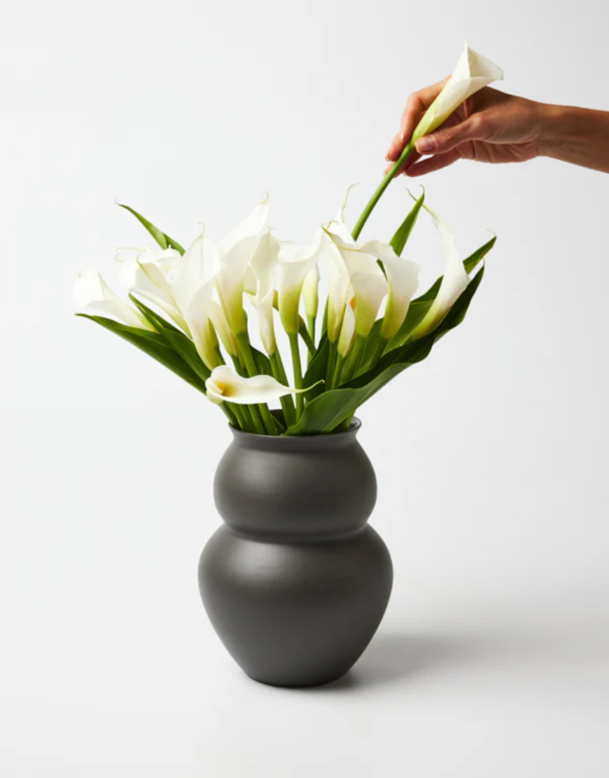 Jones & Co Happy Vase Wide Stormy, a stylish ceramic vase with a wide opening and stormy blue finish, perfect for floral arrangements.