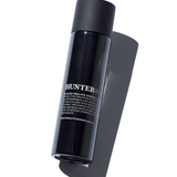 Hunter Lab Marine Healing Essence 125ml bottle, a nourishing bath and body product with marine extracts for skin revitalization.