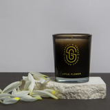 Scarlet & Grace Lotus Flower 60g candle with a decorative floral design, perfect for creating a calming ambiance