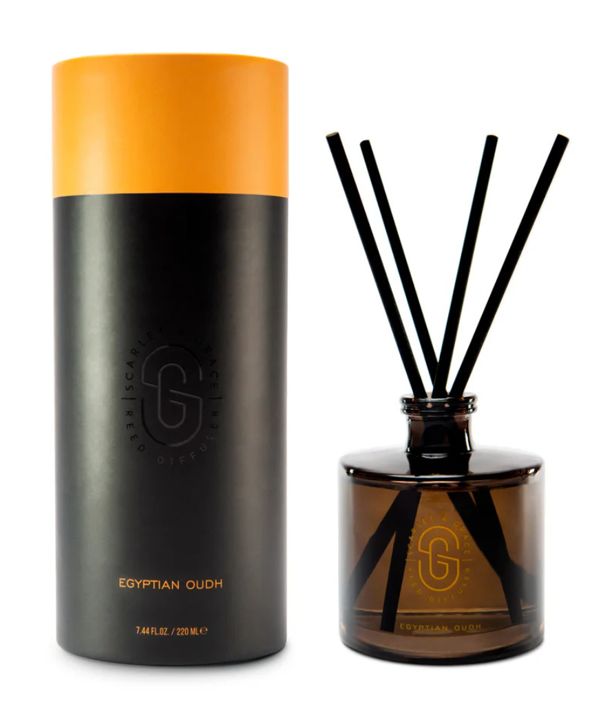 Scarlet & Grace Egyptian Oud diffuser 220ml, elegant glass bottle with reed sticks, emitting warm, woody fragrance.