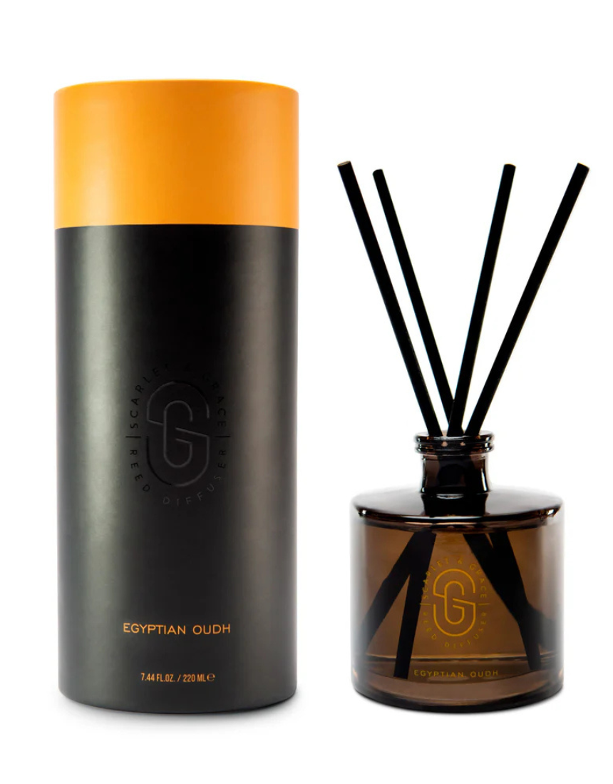 Scarlet & Grace Egyptian Oud diffuser 220ml, elegant glass bottle with reed sticks, emitting warm, woody fragrance.