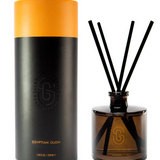 Scarlet & Grace Egyptian Oud diffuser 220ml, elegant glass bottle with reed sticks, emitting warm, woody fragrance.