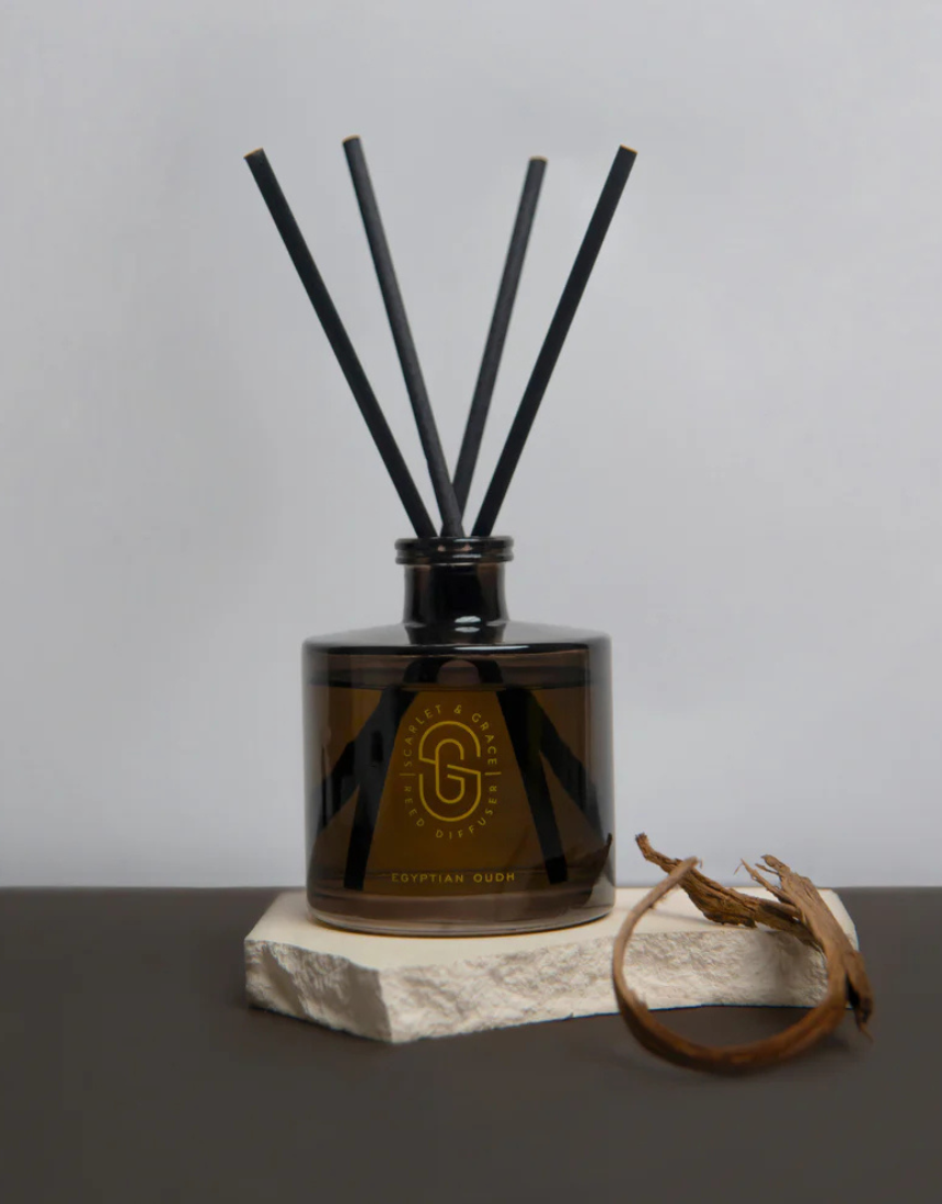 Scarlet & Grace Egyptian Oud diffuser 220ml with elegant glass bottle and reed sticks for home fragrance.