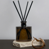 Scarlet & Grace Egyptian Oud diffuser 220ml with elegant glass bottle and reed sticks for home fragrance.