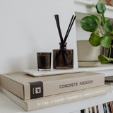 Scarlet & Grace Egyptian Oud diffuser in a 220ml glass bottle with reed sticks, showcasing elegant design and warm scent.