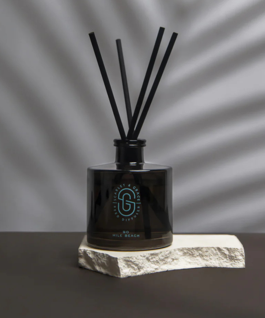 Scarlet & Grace 90 Mile Beach diffuser with a 220ml glass bottle and reed sticks, designed for home fragrance.