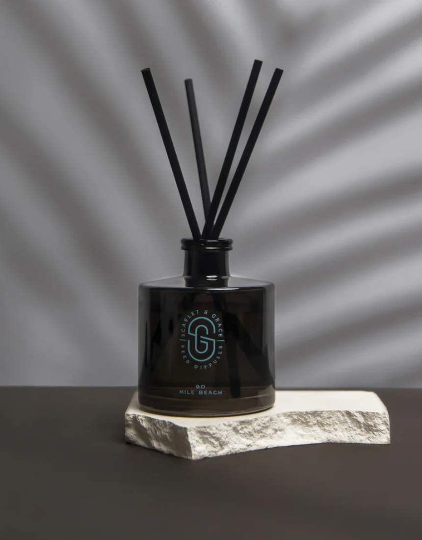 Scarlet & Grace 90 Mile Beach diffuser with a 220ml glass bottle and reed sticks, designed for home fragrance.