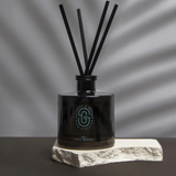 Scarlet & Grace 90 Mile Beach diffuser with a 220ml glass bottle and reed sticks, designed for home fragrance.