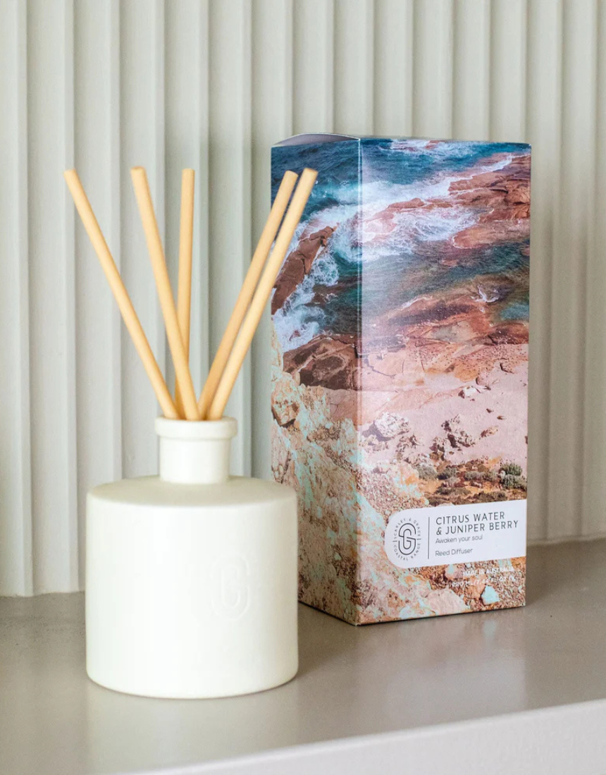 Scarlet & Grace ceramic diffuser with citrus water and juniper berry scent, 220ml, displayed with scent bottles in the image.