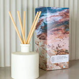 Scarlet & Grace ceramic diffuser with citrus water and juniper berry scent, 220ml, displayed with scent bottles in the image.