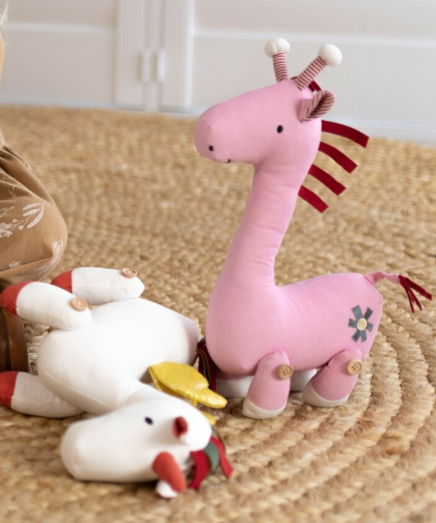 Lily & George Georgia Giraffe soft toy with a plush body and long neck, featuring soft yellow and brown colors.