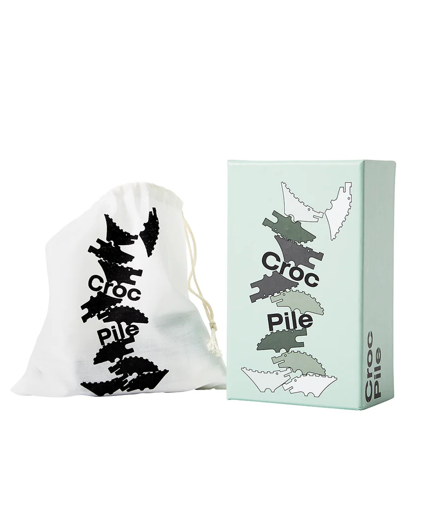 Areaware Croc Pile Mini kids' plush toy in green with textured croc pattern, soft and colorful for children.
