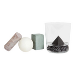 Areaware drink rocks shaped like various geometric figures, used to chill beverages in style.