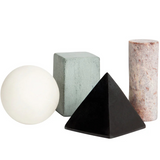 Areaware Drink Rocks Shapes set featuring various geometric and playful stone-like designs for chilling beverages.