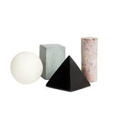 Areaware Drink Rocks Shapes set featuring colorful, geometric stone-like ice cubes for enhancing beverage presentation.