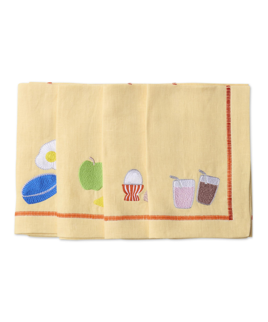 Kip & Co embroidered linen napkin set with "Breakfast Is Served" design, four elegant cloth napkins for dining occasions.