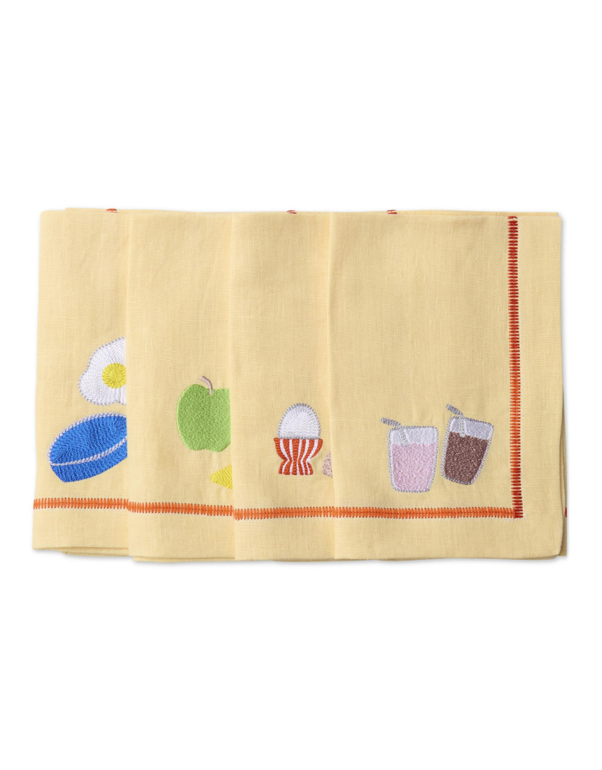 Kip & Co embroidered linen napkin set with "Breakfast Is Served" design, four elegant cloth napkins for dining occasions.