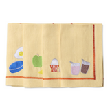 Kip & Co embroidered linen napkin set with "Breakfast Is Served" design, four elegant cloth napkins for dining occasions.